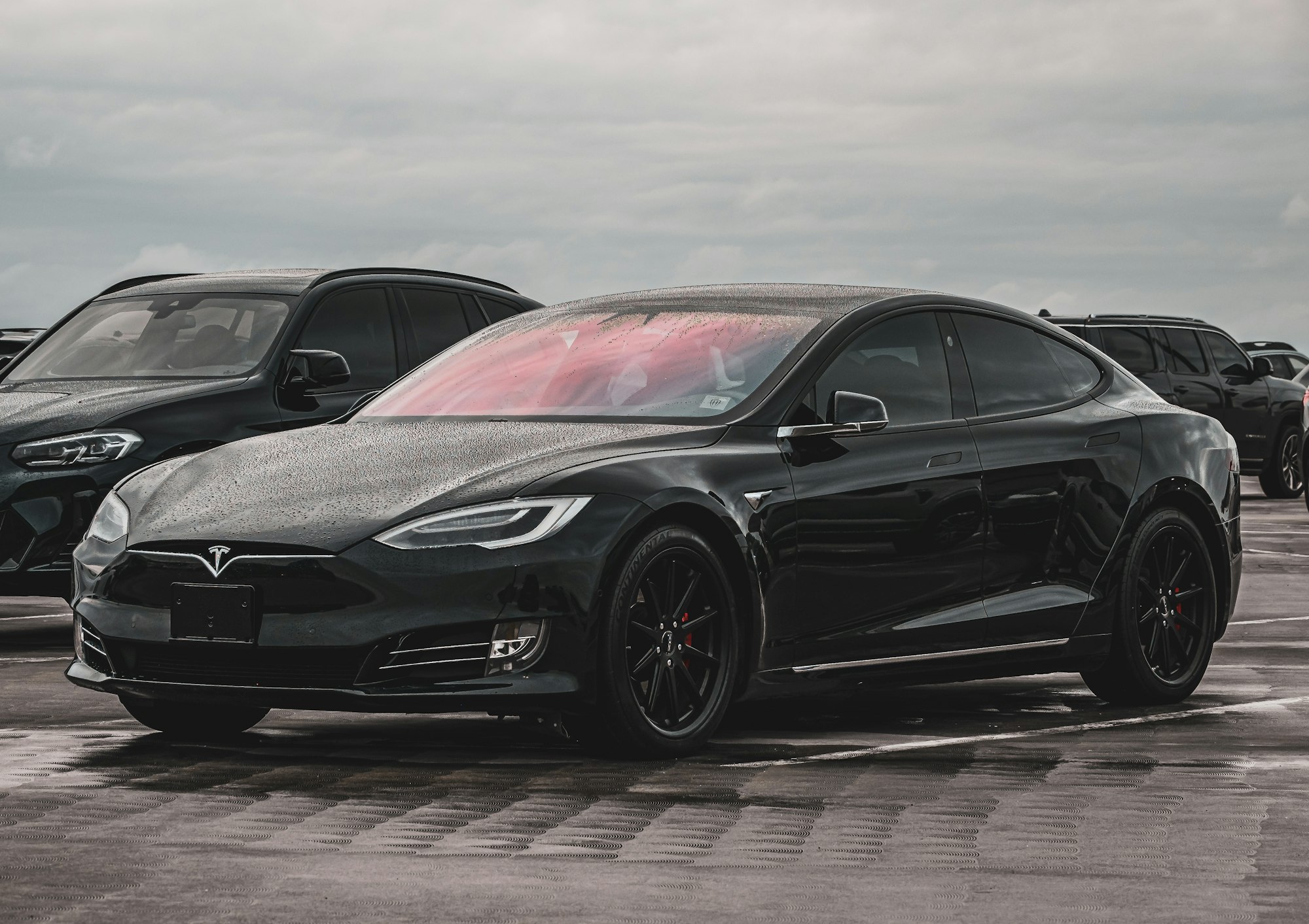 Black Tesla Model S with the 2016-and-later front end